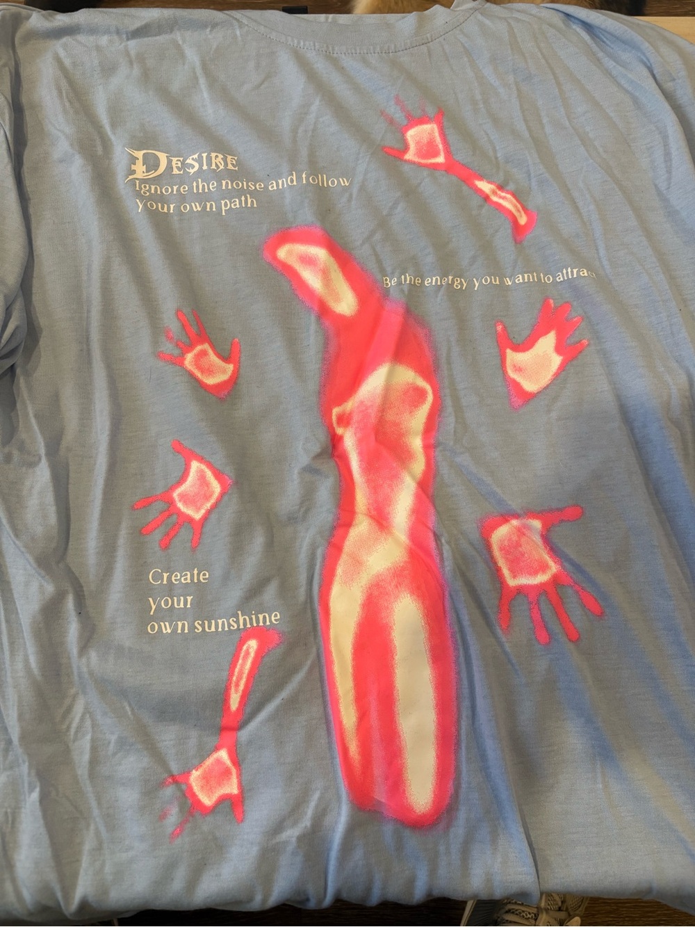 Blue Graphic Tee with Pink Abstract Figure